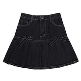 Denim-Faltenrock mit Schleife
